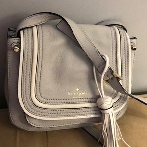 Kate Spade Gray with white stripe crossbody bag.